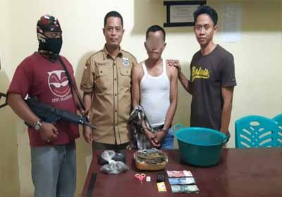 Penangkapan pengedar ganja dan sabu-sabu di Kabupaten Pelalawan. Foto : Tribun Pekanbaru