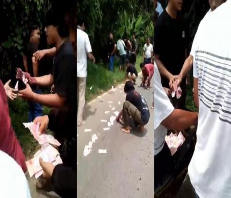 Tauke sawit dibantu warga memungut uang yang dihamburkan pelaku perampokan (foto/int)