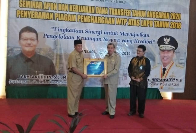 Penyerahan WTO kepada kepala daerah se-Riau, Selasa (29/10/2019) siang di Grand Ballroom Hotel Arya Duta.