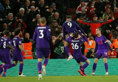 Liverpool merayakan kemenangan.