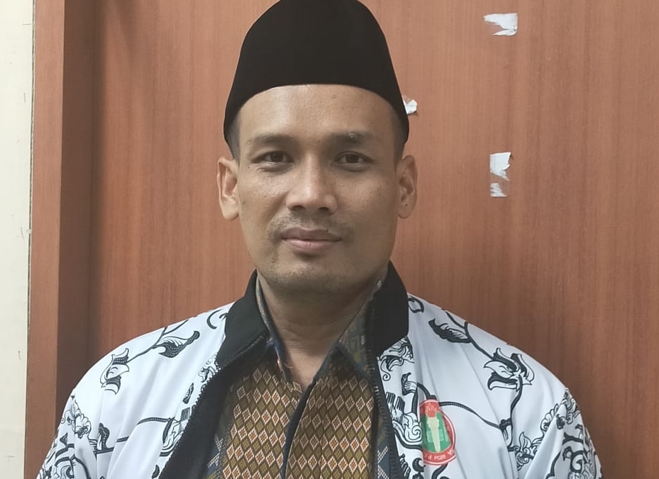 Ketua PGRI Riau, Dr. M. Syafi