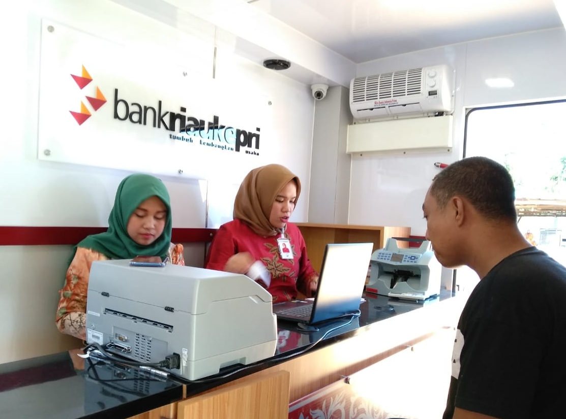 Bank Riau Kepri Kanca Pasir Pangaraian siap melayani‎ penukaran uang baru secara keliling 