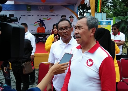 Gubri Syamsuar beri keterangan ke media usai hadiri Hari Disabilitas Internasional, Minggu (8/12/2019) siang di kantor Dinas Sosial Riau.