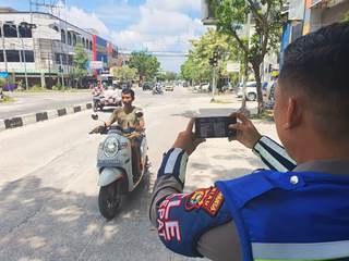 Tim khusus ETLE Mobile Handle dari Satlantas Polresta Pekanbaru (foto/bayu-halloriau)