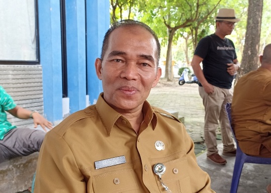 Kepala Dinas Koperasi dan Usaha Mikro Kecil Menengah Kota Pekanbaru, Sarbaini (foto/rahmat)