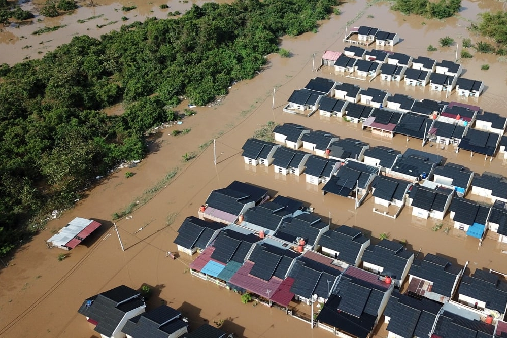 Banjir merendam permukiman warga Pekanbaru. 