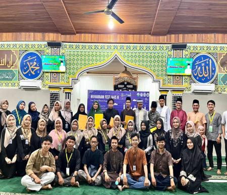 Mahasiswa Kukerta Unri, UIR dan STAIN Bengkalis dalam kegiatan Muahram Fest di Desa Sejangat Bengkalis.(foto: istimewa)