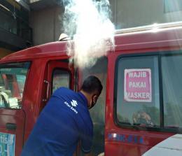 Fogging disinfektan terhadap 1.101 unit angkutan kota (angkot) di Jakarta.