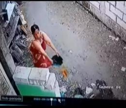 Pelaku penyiram air kencing dan buang sampah di rumah tetangga (foto/int)