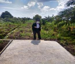Progres pembangunan jalan menuju pemakaman di Desa Tanjung Peranap yang mangkrak