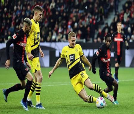 Pertandingan Bayer Leverkusen vs Borussia Dortmund.(foto: int)
