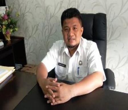 Kepala Dinas Tenaga Kerja dan Transmigrasi Provinsi Riau, Imron Rosyadi (foto/int)