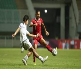 Pemain Garuda Asia dan pemain Guam saat laga perdana Grup B Kualifikasi Piala AFC U-17 2022 di Stadion Pakansari.(foto: pssi.org)