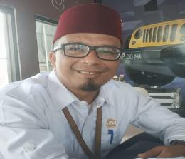 Komisioner KI Provinsi Riau Bidang Advokasi, Sosialisasi dan Edukasi, Asril Darma.(foto: istimewa)