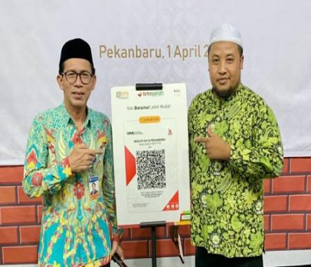 Deputi Kepala KPW BI Riau, Achmad Darimy, dan Ketua DMI Riau, Mizan Asnawi.(foto: istimewa)
