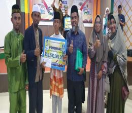 M. Imam Al Ala Hudromi berhasil menyabet Juara I Lomba pidato berbahasa Indonesia yang digelar oleh Balai Bahasa Provinsi Riau