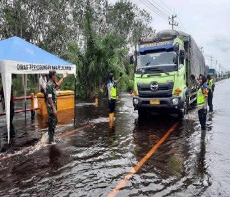 Banjir di wiilayah Pelalawan.(foto: mcr)
