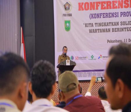 Pj Wako Muflihun hadiri KLB Provinsi XVI PWI Riau yang berlangsung di Pekanbaru (foto/ist)