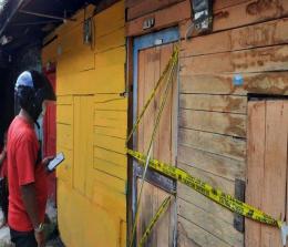 Rumah kontrakan tempat penemuan mayat. Foto tribunpekanbaru
