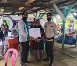 Polsek Kuala Cenaku memantau kegiatan BLT kepada 90 KPM di Desa Kuala Mulia